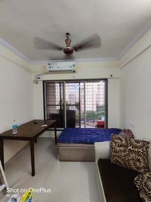 Living Room in 1 BHK Apartment at VR Bhoomi Acres G Wing, Ghodbunder Road – for Rent