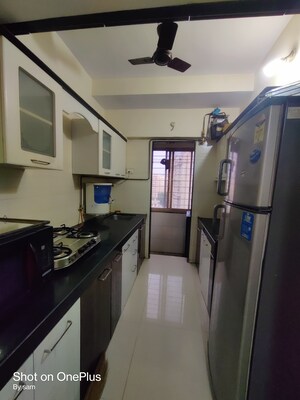 Kitchen in 1 BHK Apartment at VR Bhoomi Acres G Wing, Ghodbunder Road – for Rent