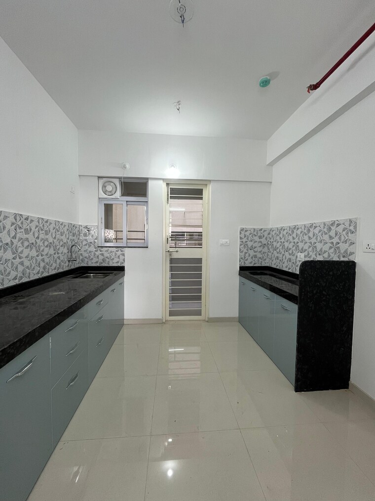Kitchen, goel-ganga-altus 2 Bedroom 696 Sq.Ft. Apartment In Kharadi Pune 9284001