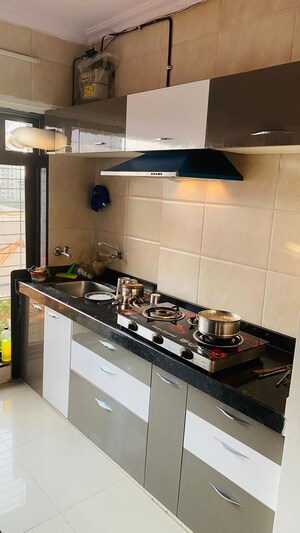 Kitchen in 3 BHK Apartment at Hirani Vishal Enclave, Dahisar East – for Sale