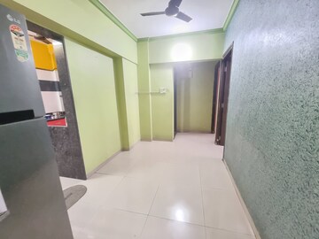 Living Room in 2 BHK Apartment at Dahisar West – for Sale