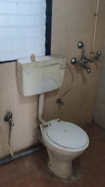 Bathroom in 2 BHK Apartment at Tilak Nagar – for Rent