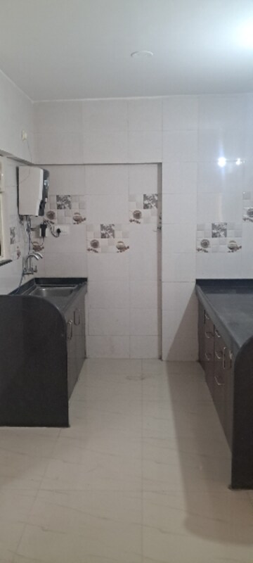 Kitchen in 2 BHK Apartment at Aswani Green Valley, Wakad – for Rent