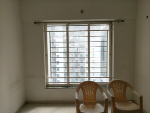 Room in 1 BHK Apartment at Shroff Signature Heights, Wakad – for Rent