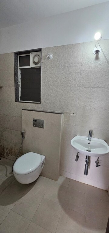 Bathroom in 3 BHK Apartment at Senapati Bapat Road – for Rent