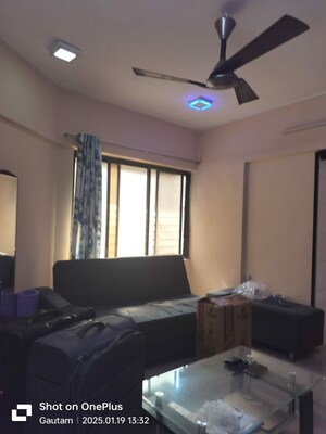 Living Room in 1 BHK Apartment at Green Fields Apartment, Andheri East – for Rent