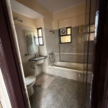 Bathroom in 3 BHK Apartment at Niho Saffron Scottish Garden, Ashiana Greens – for Rent