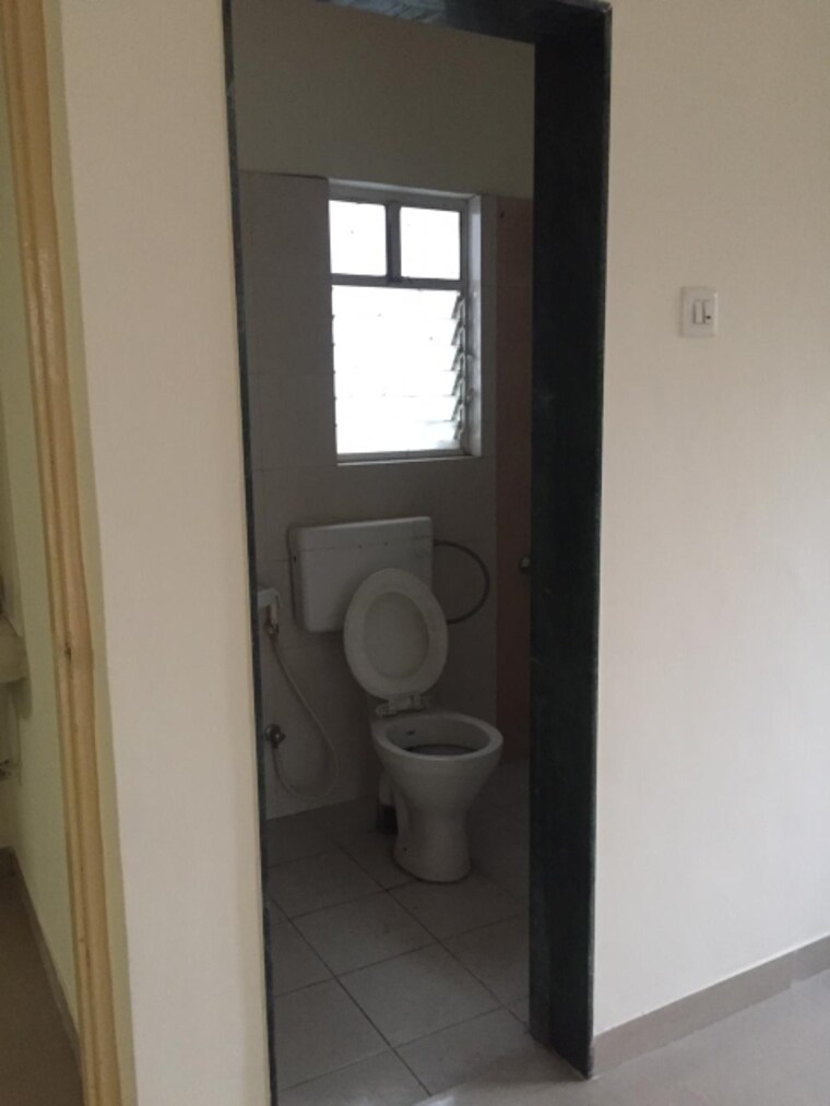 Bathroom, wakad 2 Bedroom 850 Sq.Ft. Apartment In Wakad Pune 9284511