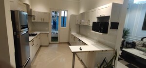Kitchen in 5 BHK Apartment at Prateek Edifice, Sector 107 – for Rent