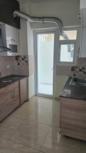 Kitchen in 3 BHK Apartment at Gaur City 7th Avenue, Sector 4 Greater Noida – for Rent