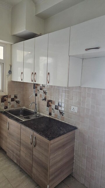 Kitchen in 3 BHK Apartment at Gaur City 7th Avenue, Sector 4 Greater Noida – for Rent