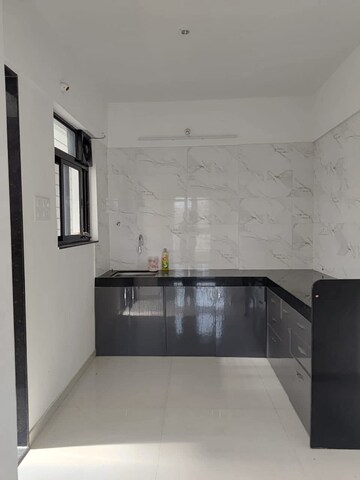 Kitchen in 2 BHK Apartment at Kiran Sufal, Wakad – for Rent