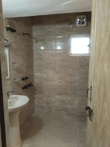 Bathroom in 2 BHK Apartment at Arun Vihar Sector 37, Sector 37 – for Rent