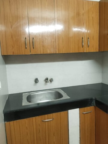 Kitchen in 2 BHK Apartment at Arun Vihar Sector 37, Sector 37 – for Rent