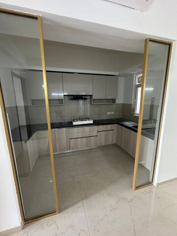 Kitchen in 3 BHK Apartment at Smart World Orchard, Sector 61 – for Rent