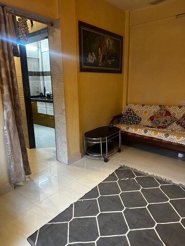Living Room in 1 BHK Apartment at Oberoi Mall, Goregaon East – for Rent