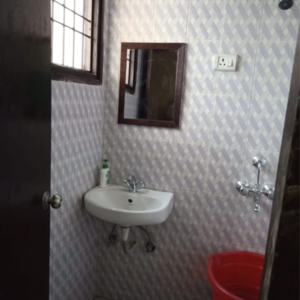 Bathroom in 2 BHK Apartment at Apex Our Homes, Garoli Kalan – for Rent