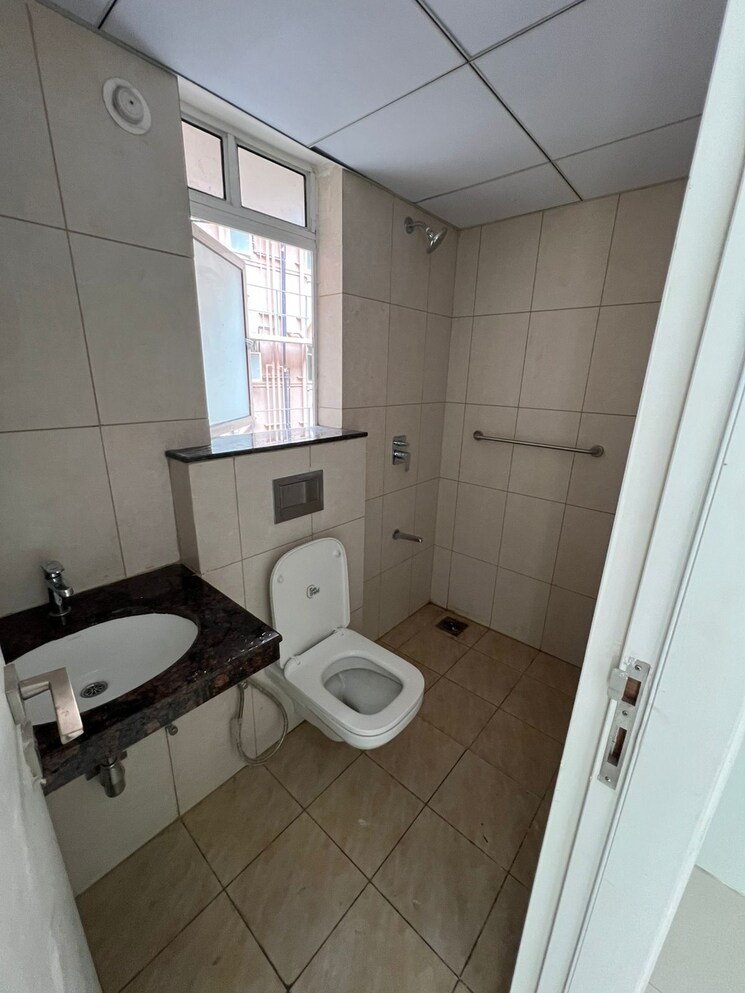 Bathroom, godrej-boulevard 2 Bedroom 691 Sq.Ft. Apartment In Manjari Pune 9285428