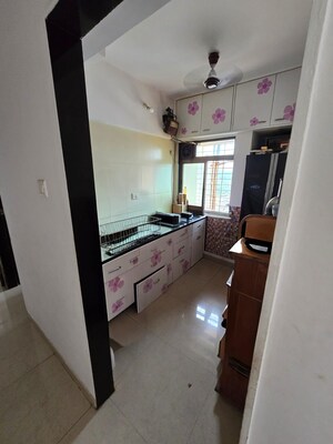 Kitchen in 1 BHK Apartment at Dosti West County, Balkum Pada – for Rent