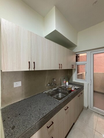 Kitchen in 2 BHK Apartment at Eldeco Acclaim, Sohna Sector 2 – for Rent