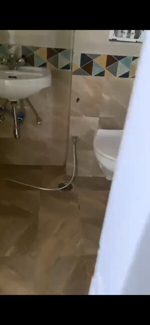 Bathroom in 4 BHK Apartment at Ansal API Celebrity Gardens, Sushant Golf City – for Rent