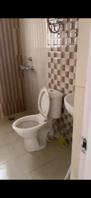 Bathroom in 4 BHK Apartment at Ansal API Celebrity Gardens, Sushant Golf City – for Rent