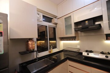 Kitchen in 3 BHK Apartment at Rustomjee Azziano Wing I, Thane West – for Rent