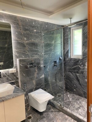 Bathroom in 4 BHK Builder Floor at Panchsheel Enclave – for Rent