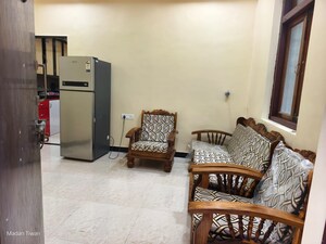 Living Room in 1 BHK Apartment at Strand House, Apollo Bunder – for Rent