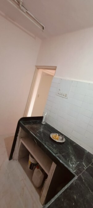 Kitchen in 1 BHK Apartment at Ulhasnagar – for Sale