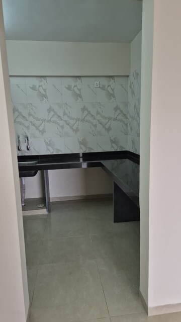 Kitchen in 2 BHK Apartment at Mittal Sun Crest, Dhayari – for Rent