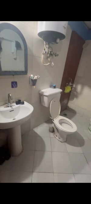 Bathroom in 3 BHK Apartment at Proview Officer City 2, Raj Nagar Extension – for Rent