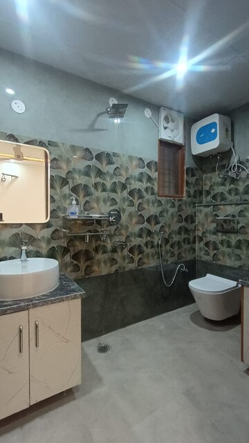 Bathroom in 3 BHK Apartment at Patel Nagar Society, Sector 15 – for Sale