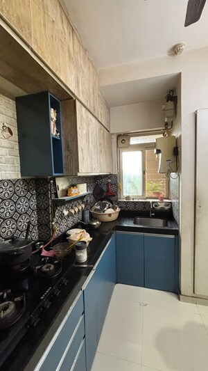 Kitchen in 2 BHK Apartment at Lodha Amara, Kolshet Road – for Rent