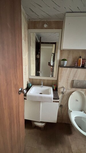 Bathroom in 2 BHK Apartment at Lodha Amara, Kolshet Road – for Rent
