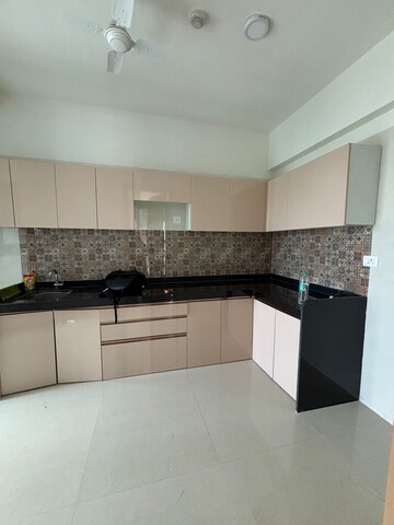 Kitchen in 2 BHK Apartment at Rajesh Raj Infinia, Malad West – for Rent