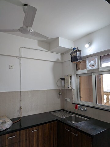 Kitchen in 2 BHK Apartment at Hiranandani Meadows, Manpada – for Rent