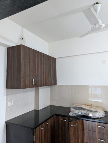 Kitchen in 2 BHK Apartment at Hiranandani Meadows, Manpada – for Rent