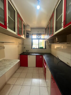 Kitchen in 3 BHK Apartment at Rosa Royale, Ghodbunder Road – for Rent