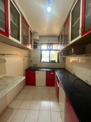 Kitchen in 3 BHK Apartment at Rosa Royale, Ghodbunder Road – for Rent