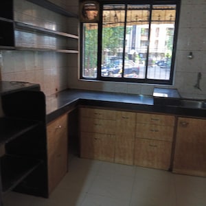 Kitchen in 2 BHK Apartment at Sarvodaya Park, Dombivli East – for Sale