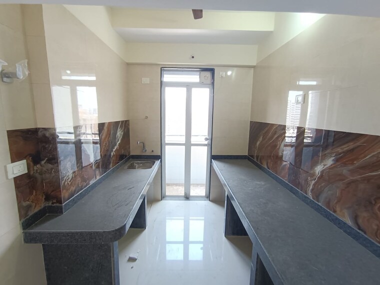 Kitchen, yogi-ajmera-bliss 2 Bedroom 999 Sq.Ft. Apartment In Kalyan West Thane 9286547