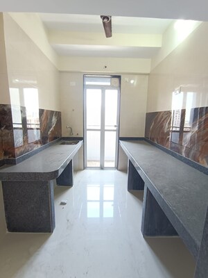 Kitchen in 2 BHK Apartment at Yogi Ajmera Bliss, Kalyan West – for Sale