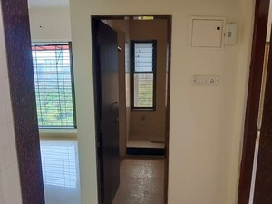 Building Lobby in 1 BHK Apartment at Suryakiran Tower, Kandivali East – for Sale