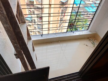Staircase in 1 BHK Apartment at Suryakiran Tower, Kandivali East – for Sale
