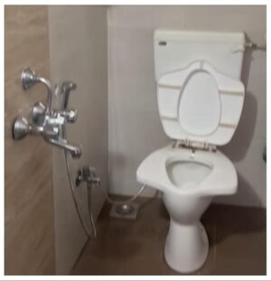 Bathroom in 2 BHK Apartment at Azad Nagar Sangam CHS, Andheri West – for Rent