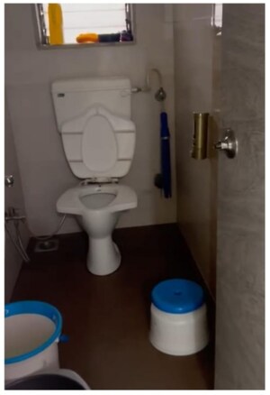 Bathroom in 2 BHK Apartment at Azad Nagar Sangam CHS, Andheri West – for Rent