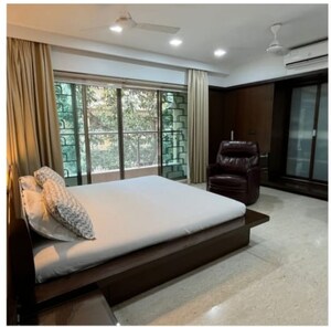 Bedroom in 4 BHK Apartment at Arihant Apartments Khar, Khar West – for Rent