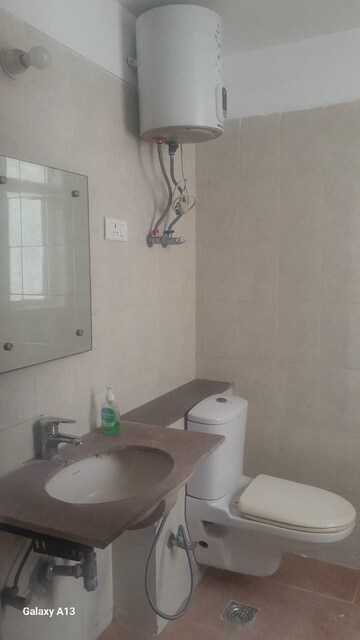 Bathroom in 4 BHK Apartment at Nirvana Country Birch Court, Sector 50 – for Rent