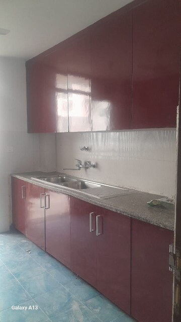Kitchen in 4 BHK Apartment at Nirvana Country Birch Court, Sector 50 – for Rent